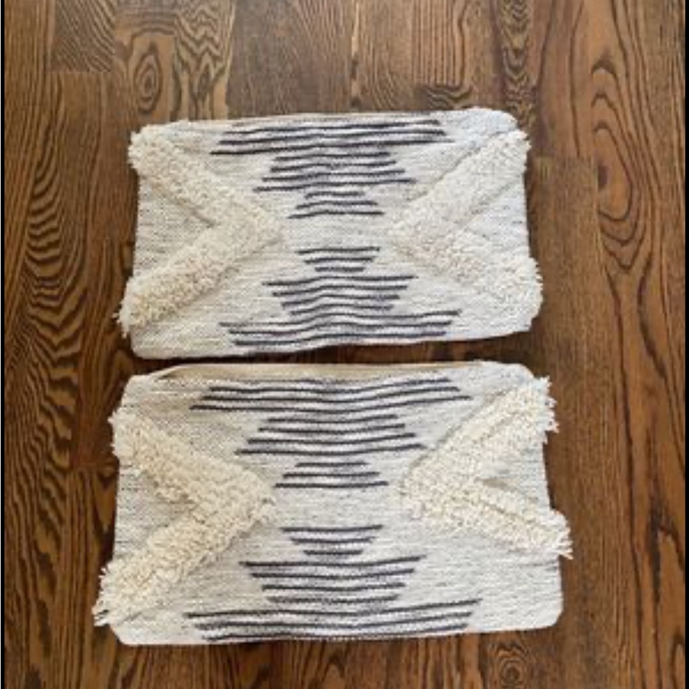 Purchased and never used.  Set of west elm lumbar pillow covers.  12w x 21l.